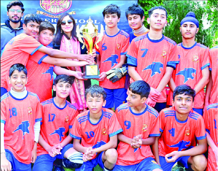 Winning team posing along with trophy. Winning team posing along with trophy.