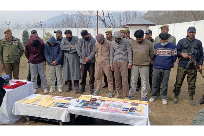 Accused arrested in online investment scam at Ganderbal on Monday. Excelsior/Firdous Accused arrested in online investment scam at Ganderbal on Monday. Excelsior/Firdous