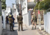 Cops deployed outside Vijay Choudhary’s house during ACB searches at Kaluchak in Jammu. —Excelsior/Rakesh