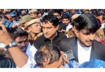 IYC chief Uday Bhanu Chib being taken into custody by police in New Delhi on Tuesday.