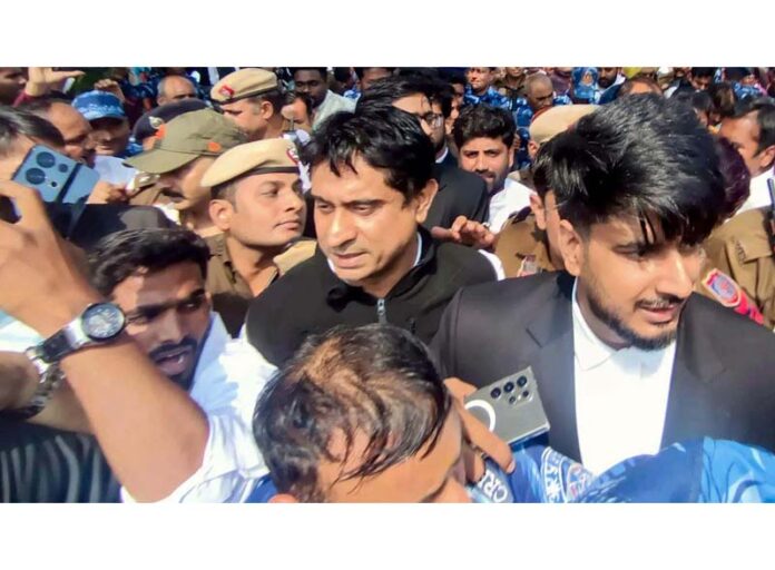 IYC chief Uday Bhanu Chib being taken into custody by police in New Delhi on Tuesday.