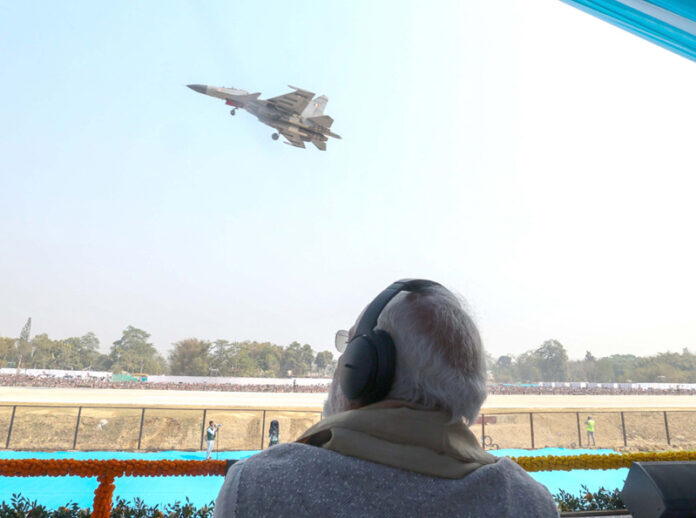Prime Minister Narendra Modi witnesses an aerial display by the IAF during his day-long visit to Assam. Prime Minister Narendra Modi witnesses an aerial display by the IAF during his day-long visit to Assam.