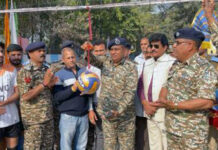 CRPF organizes Volleyball tourney CRPF officers along with others posing for a group photograph during inaugural ceremony.