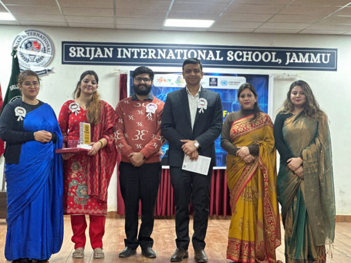 Dignitaries posing for group photograph during a programme.