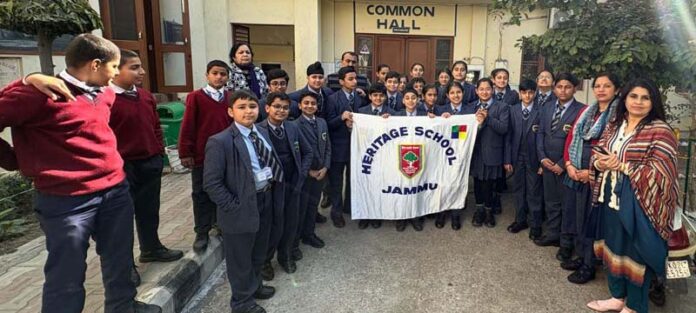 page10-10 Heritage School students posing for group photograph.