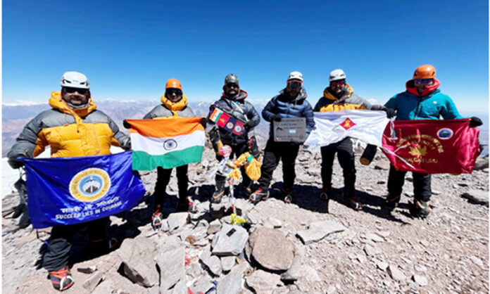 Mountaineers from NIM and JIM&WS posing with flags atop Mt. Aconcagua after successfully completing their historic ascent. Mountaineers from NIM and JIM&WS posing with flags atop Mt. Aconcagua after successfully completing their historic ascent.