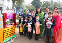 APS Domana organizes programme Dignitaries posing along with students during a programme.
