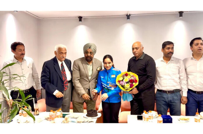 Dignitaries honouring Asia Cup Gold Medalist Aneesha Sharma during a programme.
