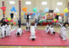 Students presenting different Yog Asanas during Annual Sports Day of Little Millennium, Jammu.