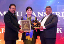 Jammu Sanskriti School teacher Swati Sharma receiving award in Delhi.