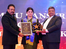 Jammu Sanskriti School teacher Swati Sharma receiving award in Delhi.