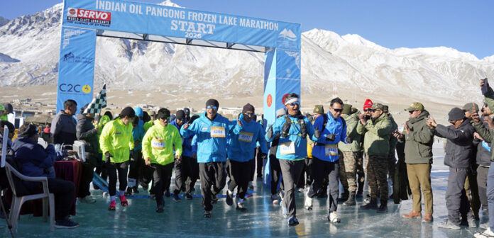 Runners in action during Frozen Lake Marathon at Pangong Lake.