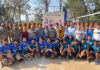 Dignitaries posing with winning team of volleyball tournament organized by 137 Bn CRPF in Udhampur.