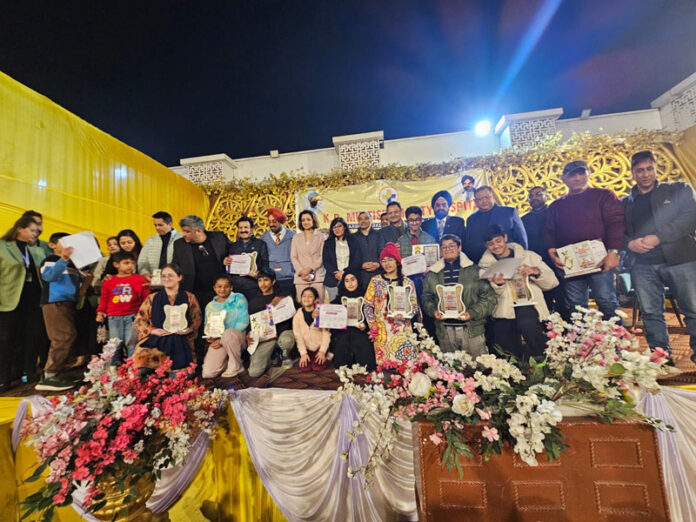 Winners posing along with winners during prize distribution ceremony. Winners posing along with winners during prize distribution ceremony.