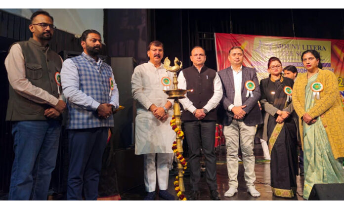 Dignitaries posing during ceremonial lamp-lighting at Mount Litera Zee School Annual Day.