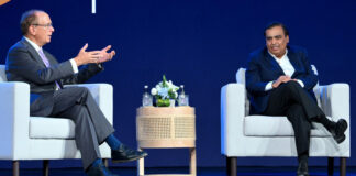 Mukesh Ambani and Larry Fink, speaking during a chat organized by JioBlackRock in Mumbai.