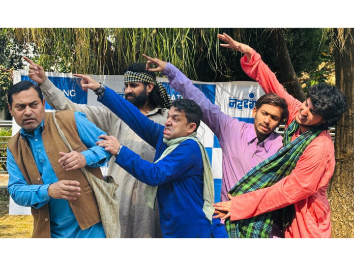 A scene from the play ‘Aag’ staged by Natrang in Jammu on Sunday. A scene from the play ‘Aag’ staged by Natrang in Jammu on Sunday.