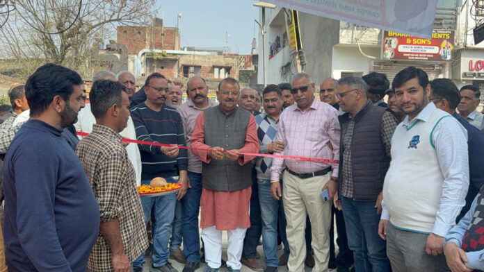 MLA, Vijaypur, C P Ganga inaugurating lane and drain work on Monday.