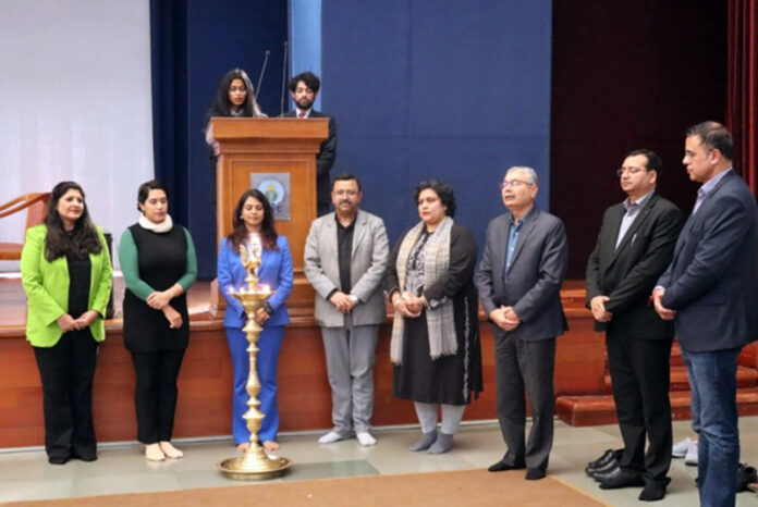 Prof R K Sharma, Vice-Chancellor, JUIT posing along with others during a function on Monday.