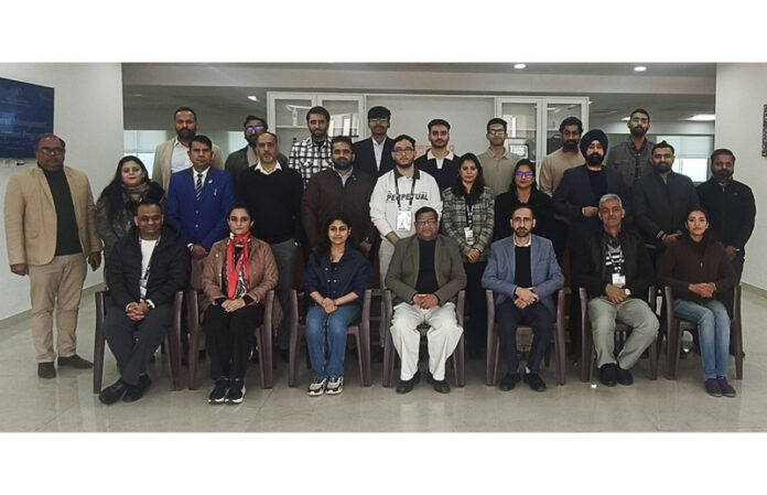 Participants pose for group photograph at inaugural of Advanced Management Development Programme at IIM Jammu.