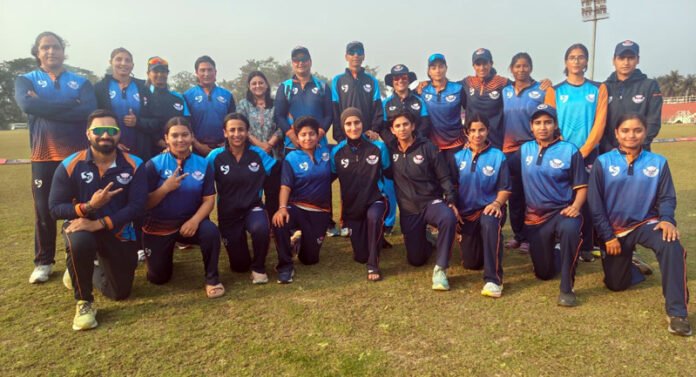 Winning team posing for group photograph.