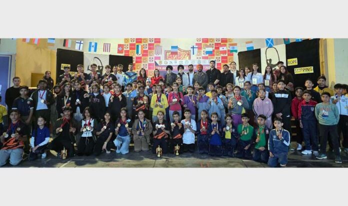 Winners posing with their medals in presence of dignitaries at 13th J&K UT Rope Skipping Championship.
