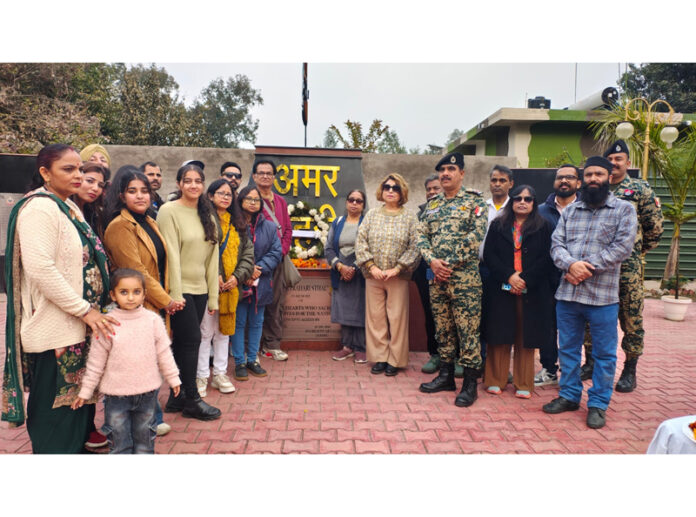 Artists and other dignitaries posing for a group photograph.