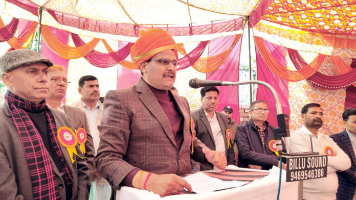 A dignitary speaking during a function organized on birth anniversary of Guru Gyagi in Jammu.