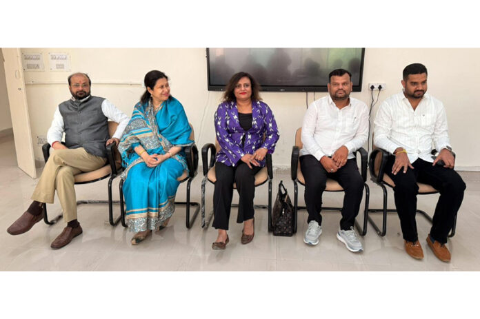 Prof Sapna Naik along with others interacting with the students at JU.