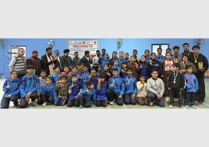 Fencers posing along with medals during prize distribution ceremony at Udhampur.