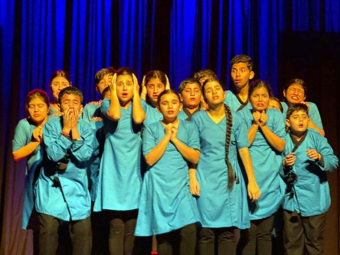 Young artists of Natrang performing during a play in New Delhi.