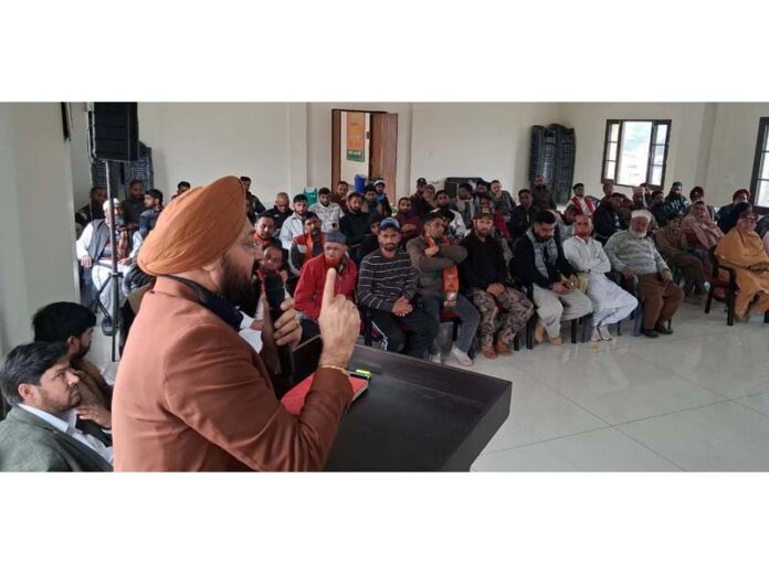 Ranjodh Singh Nalwa speaking during a meeting in Reasi.
