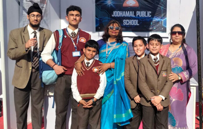 JMPS student, Amay Gupta, along with others after winning at an event organised by IIT Jammu.