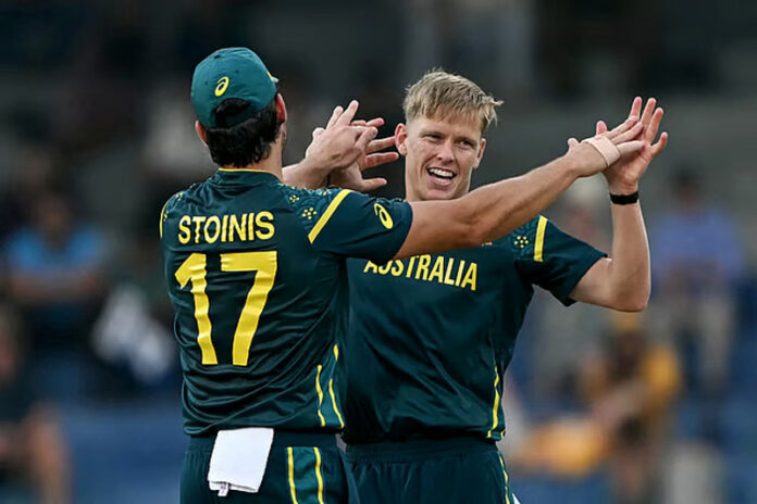 Nathan Ellis celebrating a wicket with Marcus Stoinis during a match in Colombo.