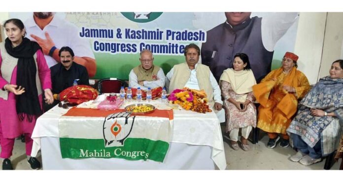 JKPCC chief T H Karra, flanked by others, addressing Mahila Congress meeting in Jammu.