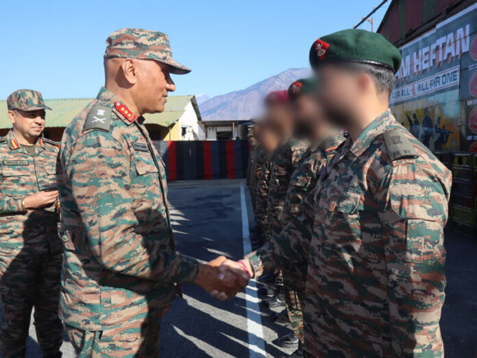 Lieutenant General Pratik Sharma meets army personnel during his visit to Kishtwar.