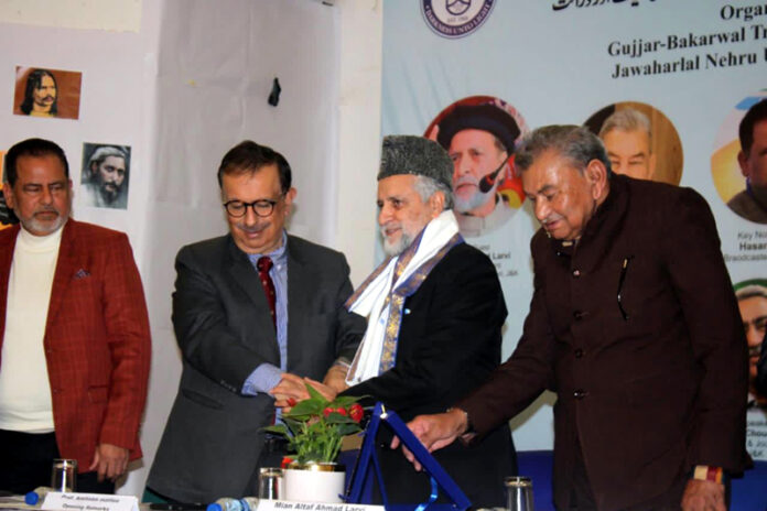 MP Mian Bashir Ahmad Larvi, Prof Amitabh Mattoo and others during the seminar at JNU in New Delhi.