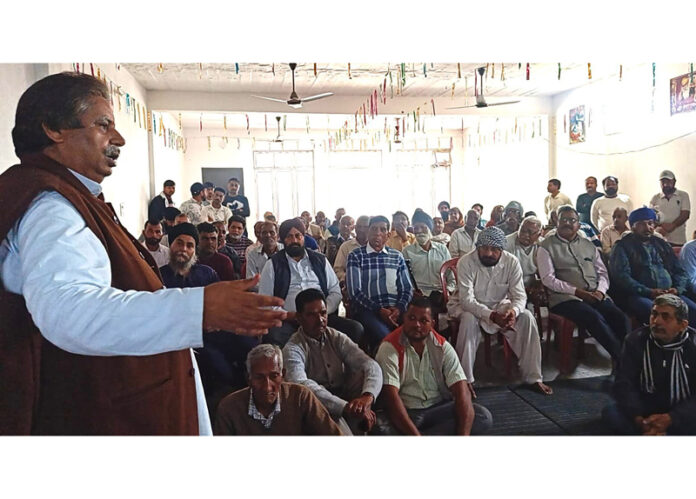 Congress leader Raman Bhalla addressing a public gathering in Jammu.