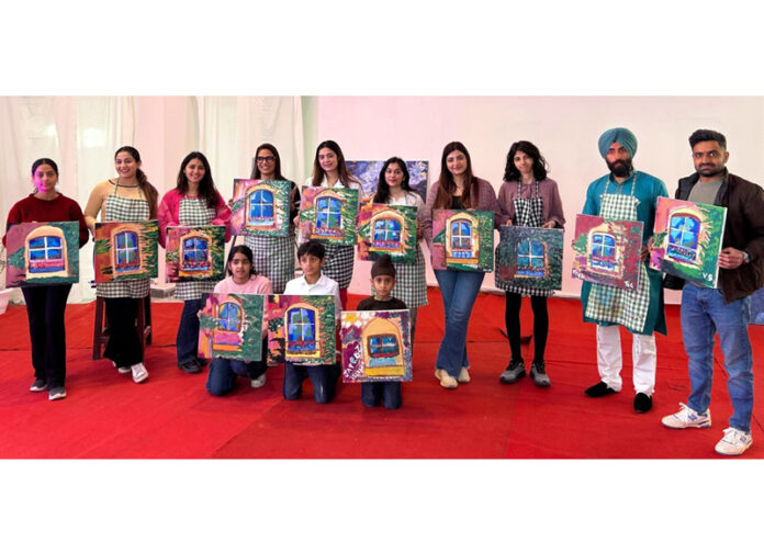 Students posing with the artistic creations during a camp in Jammu.