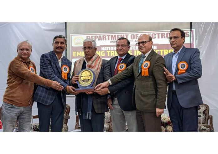 Prof Umesh Rai, Vice-Chancellor of JU, felicitating other guests during a function at JU.