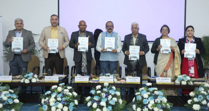 JU Vice-Chancellor and others releasing brochure of the conference during inaugural session.