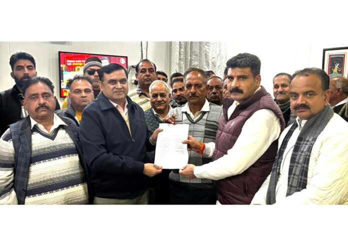 A delegation led by senior public leader, Pawan Khajuria giving memorandum of demands to Regional Officer, National Highway-44 in Jammu on Tuesday.
