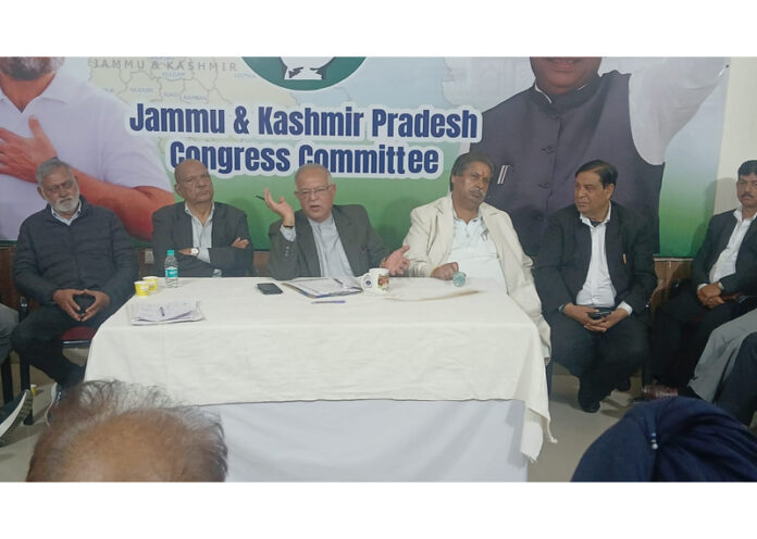 JKPCC president TH Karra addressing a party meeting in Jammu on Monday.