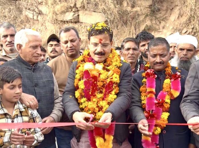 MLA Balwant Singh Mankotia inaugurating a new development project in Chenani constituency.