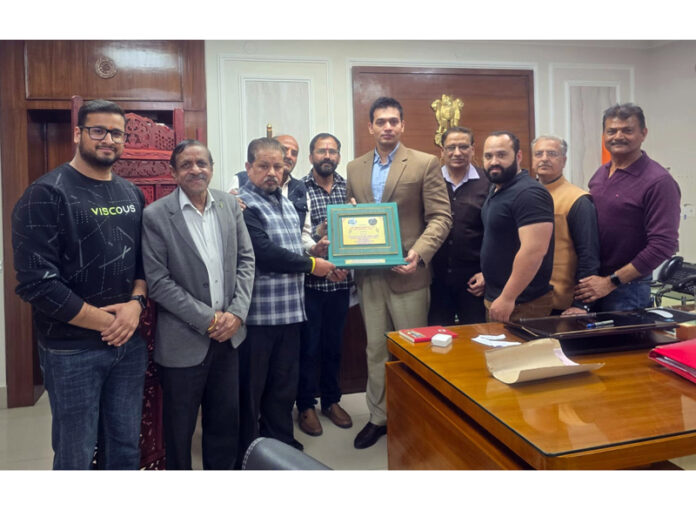 A delegation of many associations during a meeting with DC Jammu.