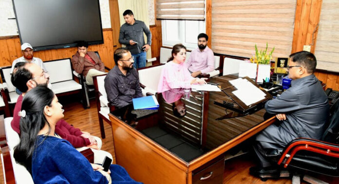 Minister Javed Rana chairing a meeting on Friday.