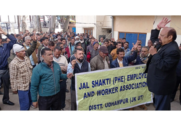 Senior Trade Union leader Som Nath addressing protesting PHE workers at Udhampur.