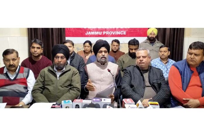 JKMEF Jammu province president Jaswinder Singh along with other office bearers addressing a press conference at Jammu. -Excelsior/Rakesh
