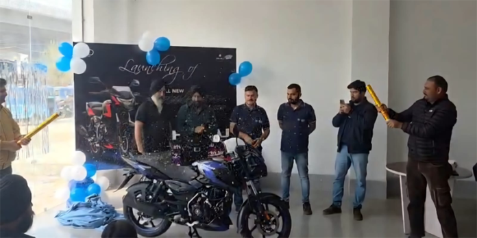 Officials launching new Bajaj Pulsar 150 in Jammu.