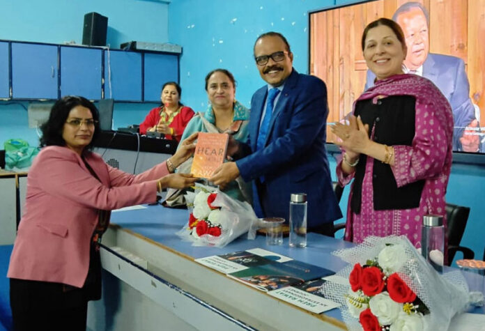 Prof (Dr) K S Chandrasekar, VC, CLUJ presenting a memento to a delegate in Jammu.